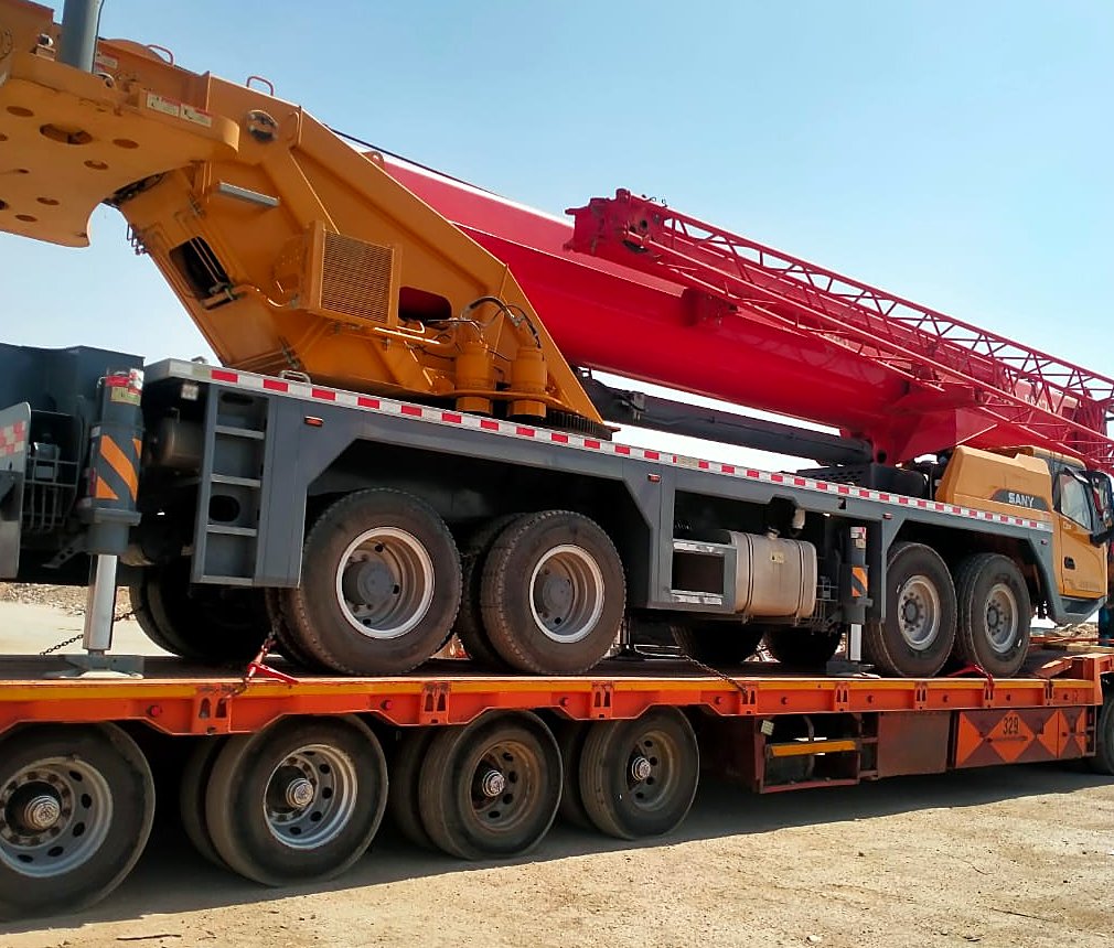 New SANY mobile crane arriving on a low-bed trailer