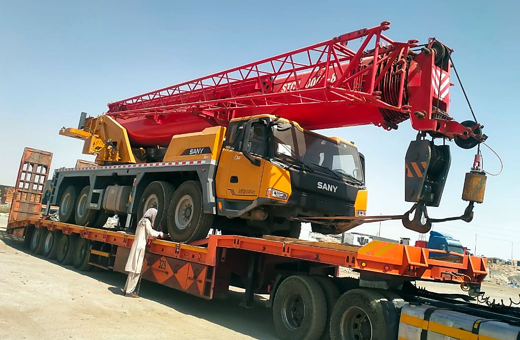 New SANY mobile crane being secured for transport